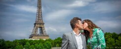 Couple walking hand-in-hand on charming street
